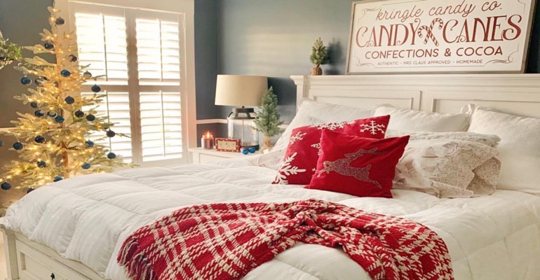 Bedroom with Christmas tree.